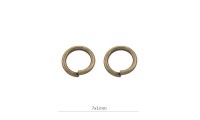 Anneau ouvert 7x1mm. Doré...